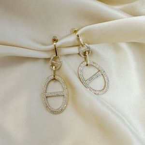 Boucles d'oreilles Glitzy (vendues par paires)